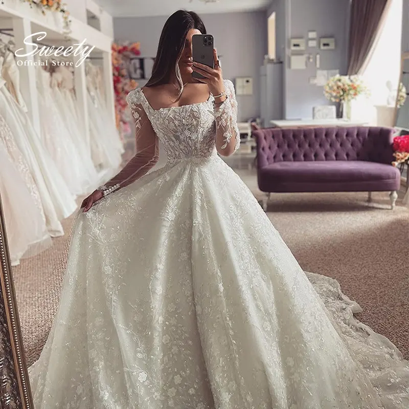 

Luxury Wedding Dress Embroidered Lace On Net With Ball Gown Train Elegant Boat Neck Full Sleeve bridal Gowns Button Robes De Ma