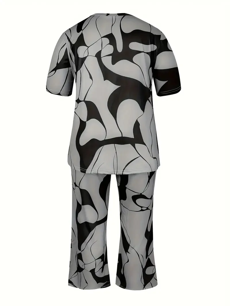Women's summer fashion print two-piece outfit with round-neck short sleeve T-shirt and wide-leg trousers in a relaxed fit. back