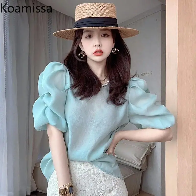 

Koamissa Elegant Women Solid Blouse Short Puff Sleeve Round Neck Loose Female Summer Shirts Office Lady Chic Korean Out Wear Top