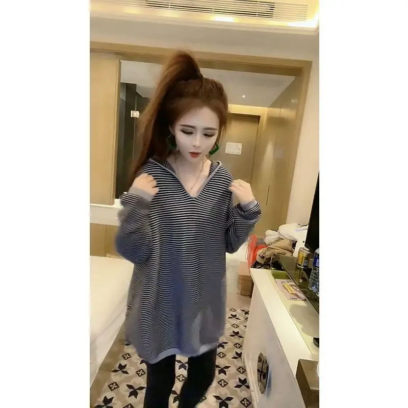 European Station Fashion Striped Knitwear Women's 2023 Autumn New Hooded Design Long Sleeve Loose Midi Sweater