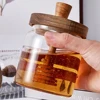 Airtight Syrup Dispenser with Wooden Dipper and Lid 18oz Honey Container Holder Honey Jar Pot Modern Honey Syrup Glass Container 5