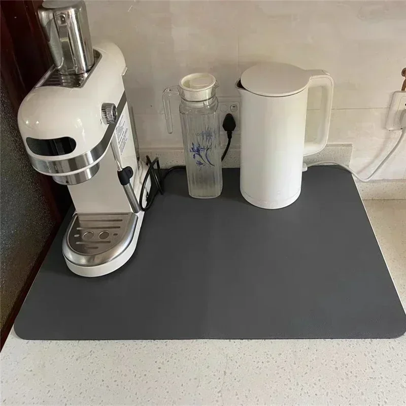 https://ae01.alicdn.com/kf/S871681441d104ceabf76fad9c49c494cz/Kitchen-Absorbent-Tableware-Placemats-Rubber-Drain-Pad-Heat-Resistant-Counter-Mat-Water-Dispenser-Machine-Moisture-proof.jpg