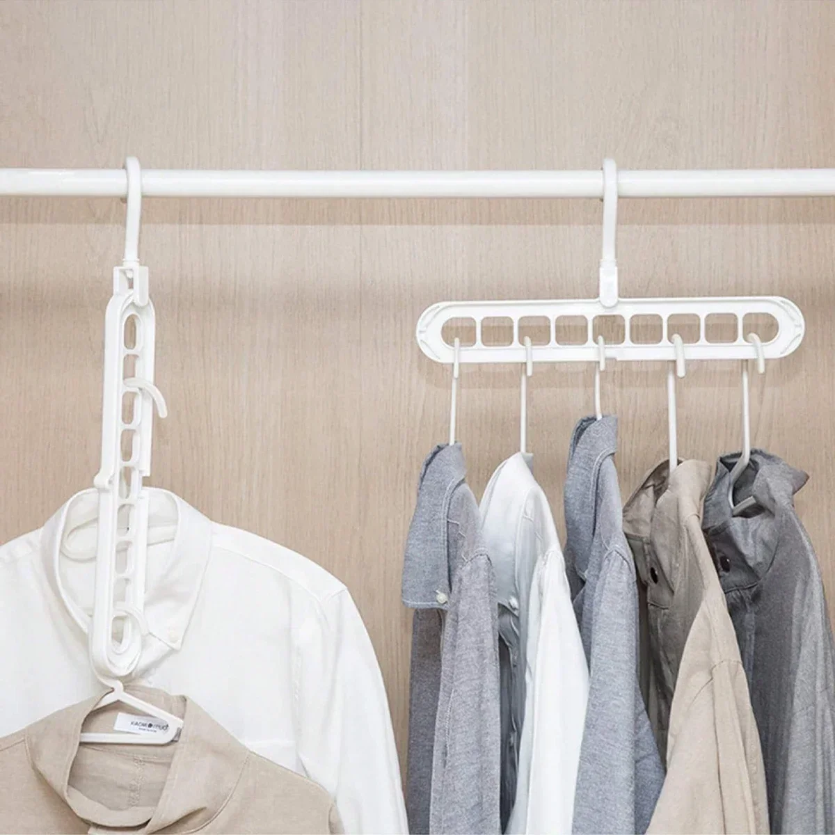 1pc - Nine hole multifunctional magic folding clothes hanger, convenient storage and space saving storage cabinet