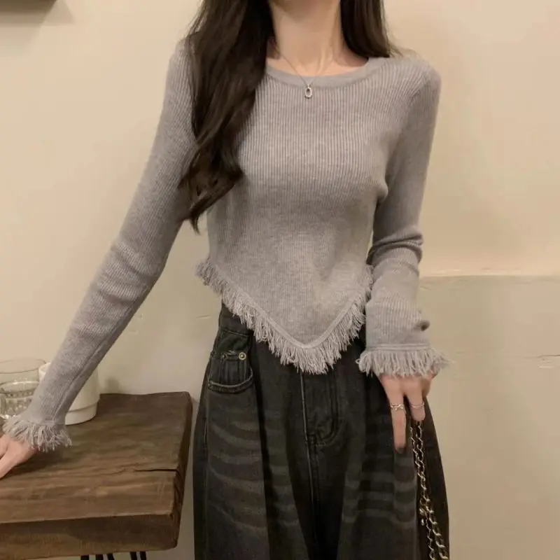 

2023 New Autumn and Winter Spicy Girls Pure Desire Style Round Neck Slim Fit Tassel Irregular Hem Fashion Knitted Sweater