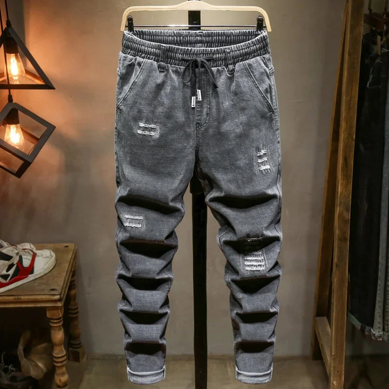 

Spring 2024 New Men's Large Size Ripped Gray Jeans Drawstring Design Stretch Denim Pants Male Brand 5XL 6XL 7XL 8XL 9XL 10XL