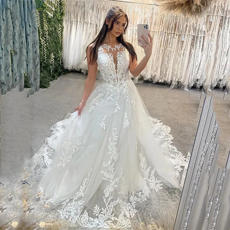 

KapokDressy Ivory Lace Wedding Dresses A Line Appliqued Lace Bride Dress Elegant Appliques Scoop Neck Modest Bride Wedding Gowns