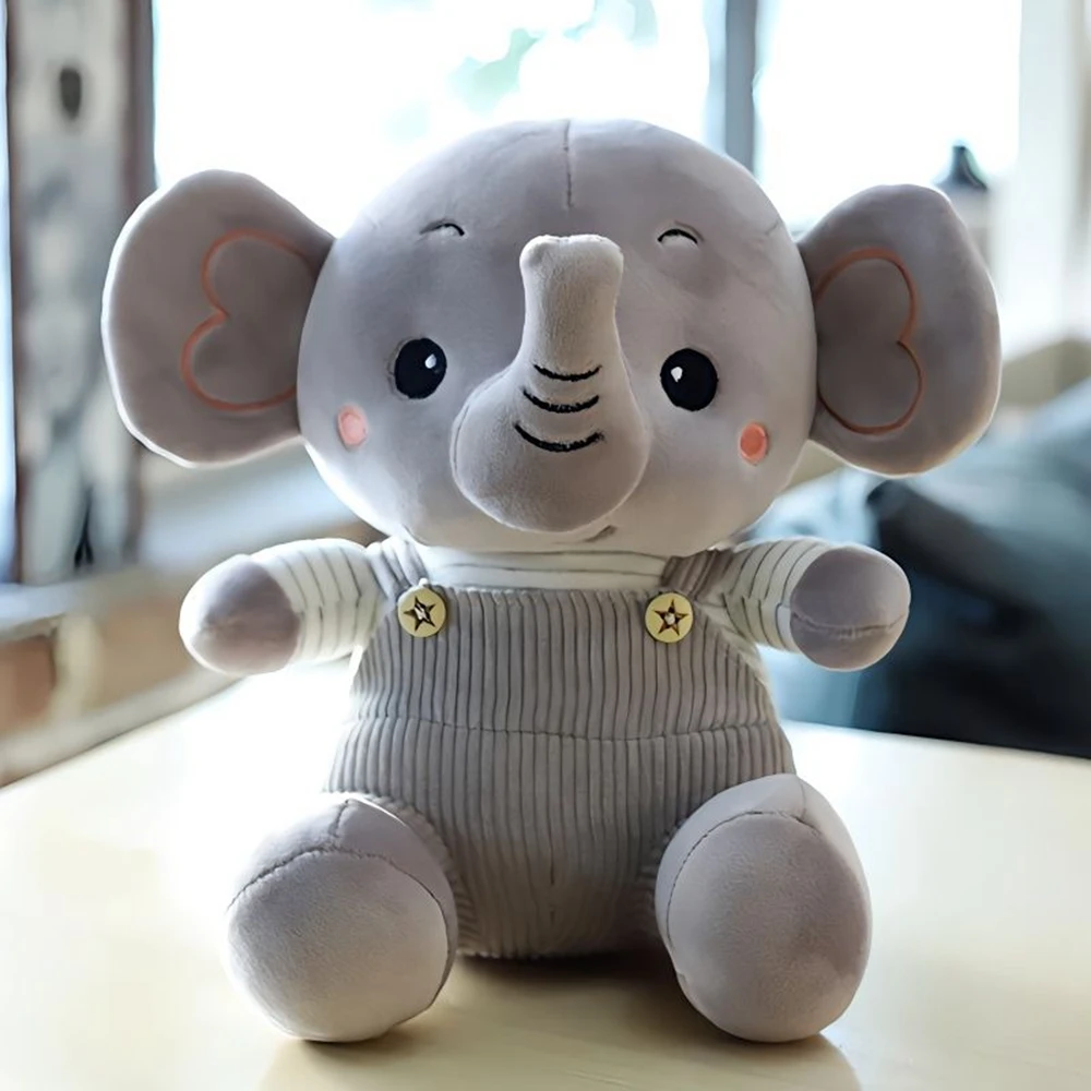 22CM Cute Overalls Elephant Plush Toy Sitting Posture Drag Baby Elephant Long Nose Doll Birthday Gift For Children And Friends конструктор lego 41421 friends baby elephant jungle rescue