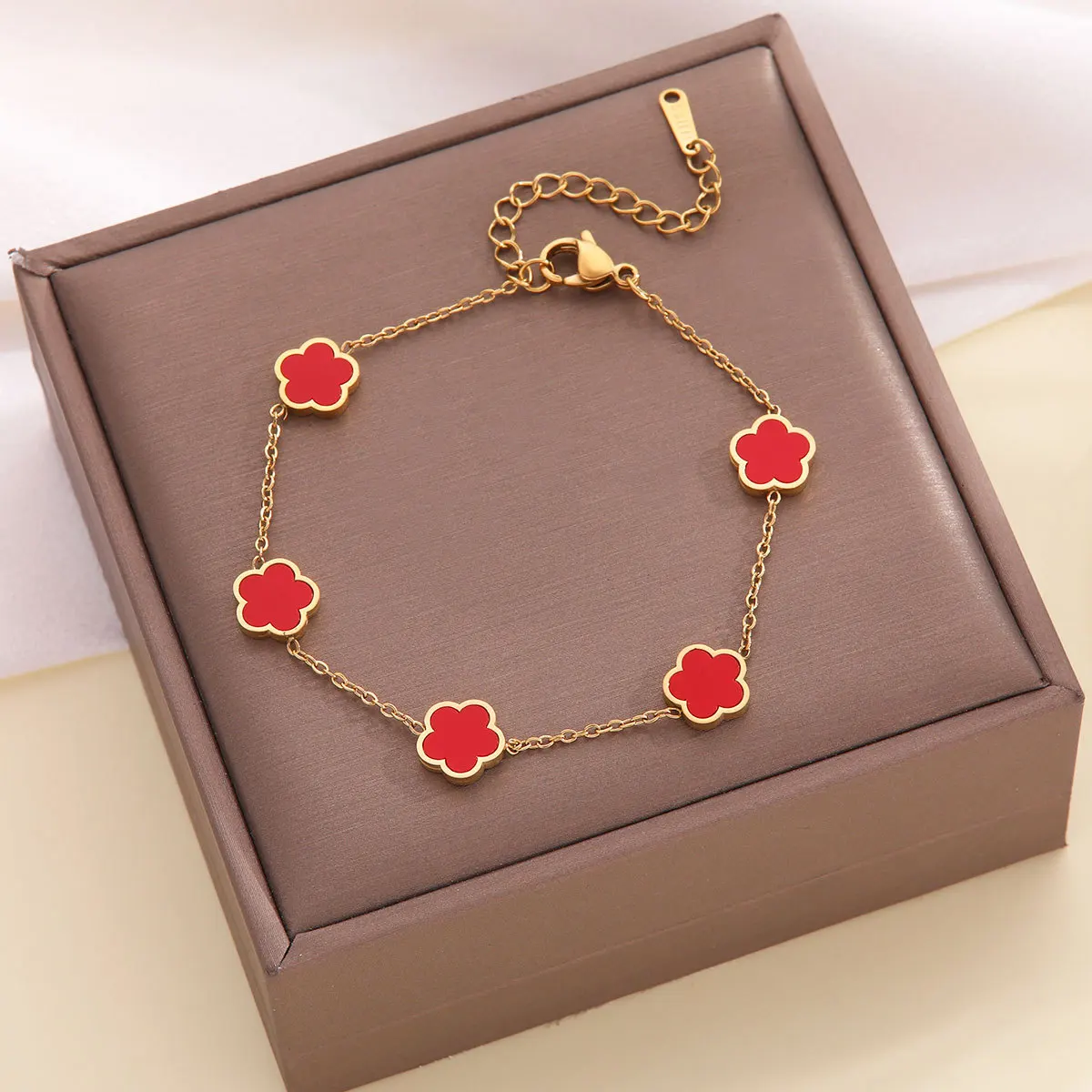 

Flower titanium steel bracelet female minority plum pendant hundred arm bracelet European and American fashion temperament multi