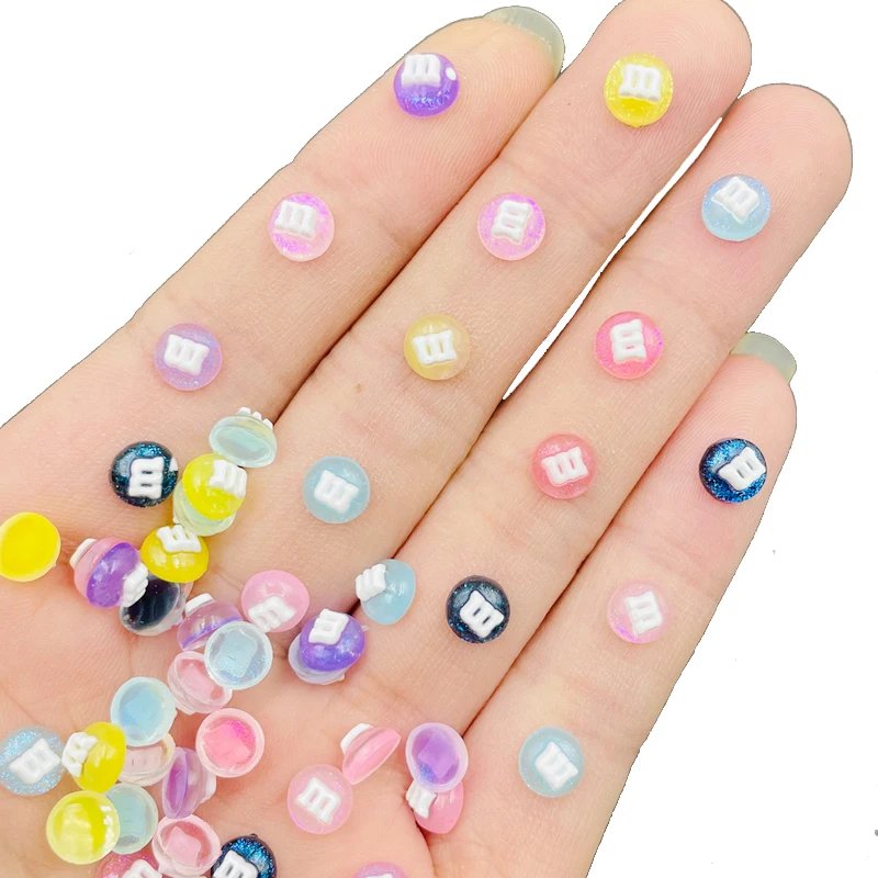 100 Pcs New Cute Mini Cartoon M Bean Candy Resin 3D Cabochon Gioielli Fai Da Te Ornamento Manicure Making Decorare Accessori