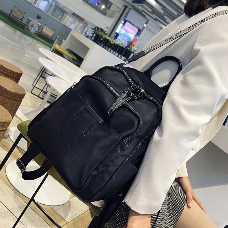 2024 nuovo zaino in tessuto Oxford da donna impermeabile per il tempo libero zaino da viaggio All-in-one borsa a doppio uso monospalla di grande capacità