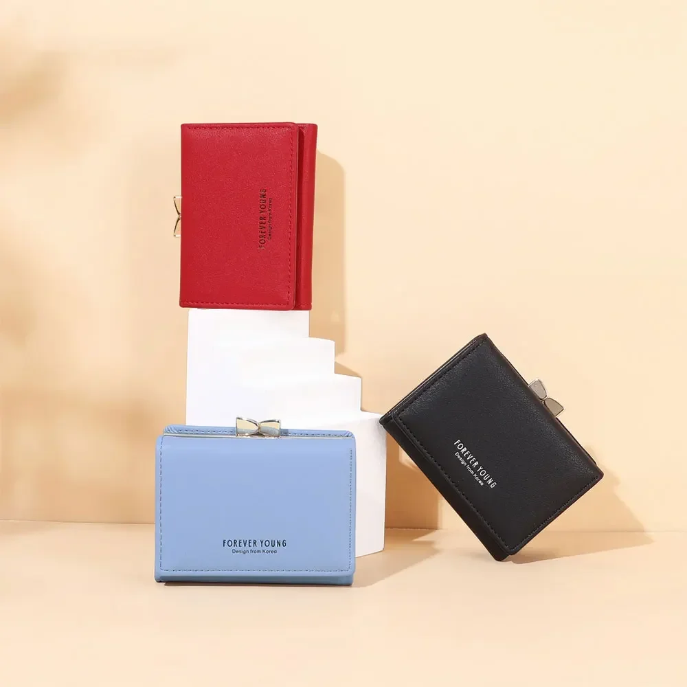 

Модный женский кожаный кошелек с милым бантом и зажимом для денег, короткий клатч с держателем для карт, новинка, Дамский кошелек для монет для девушек, кошелек тройного сложения