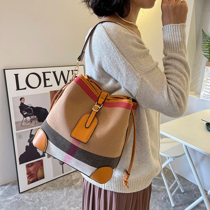 

High Quality Canvas Plaid Bucket Bag for Women with Drawstring Canvas Color Matching Shoulder Bag 2023 New Crossbody Bag