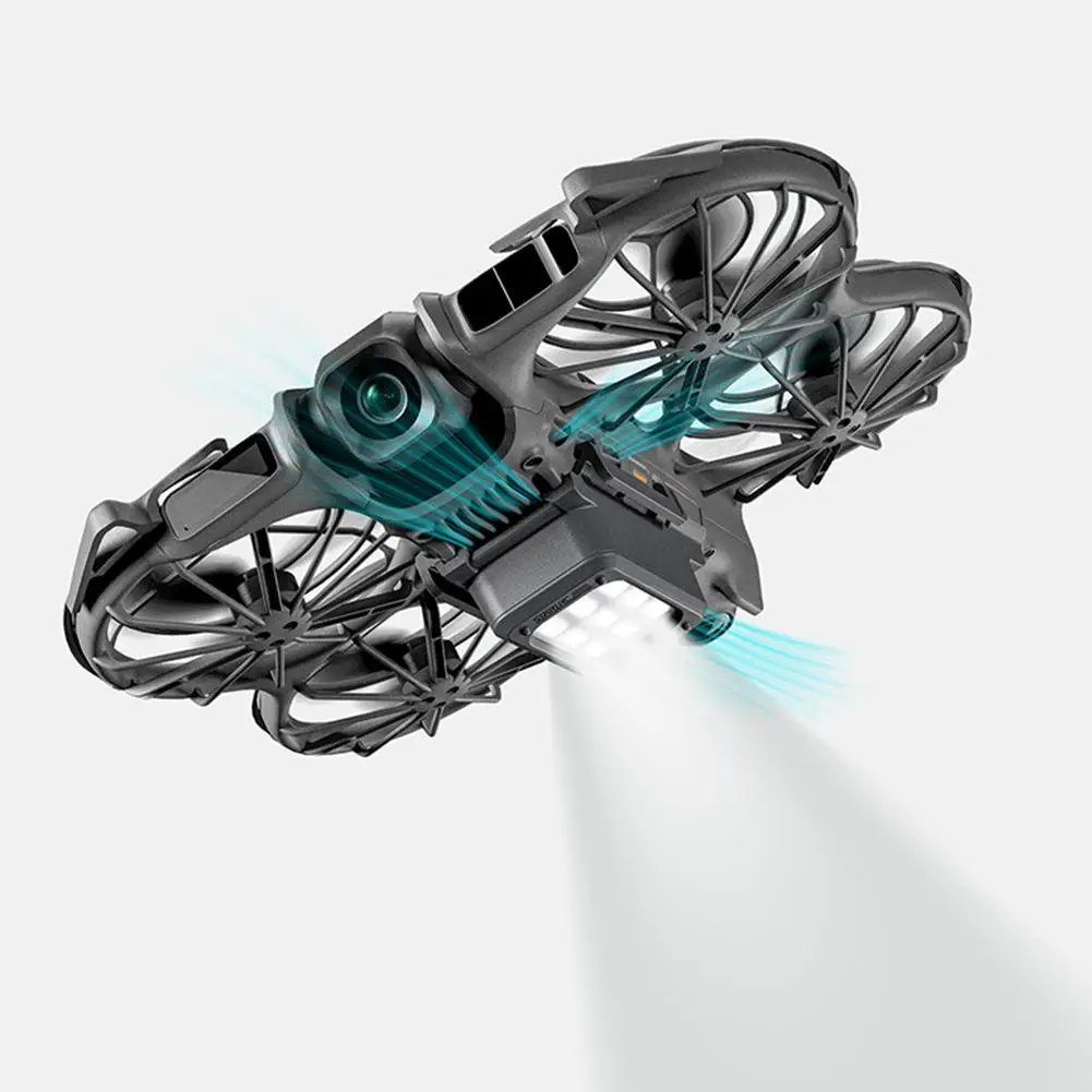 Vue rapprochée du train d'atterrissage LED pour DJI NEO2, montrant le port de charge USB-C et les LED allumées.