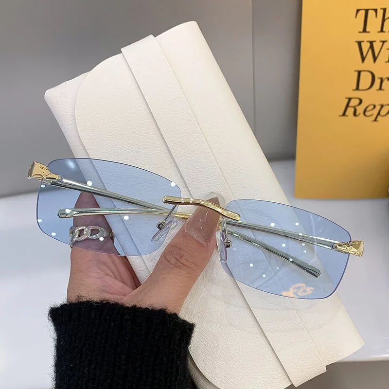 Stylish rimless rectangle sunglasses with tinted lenses and gold temples