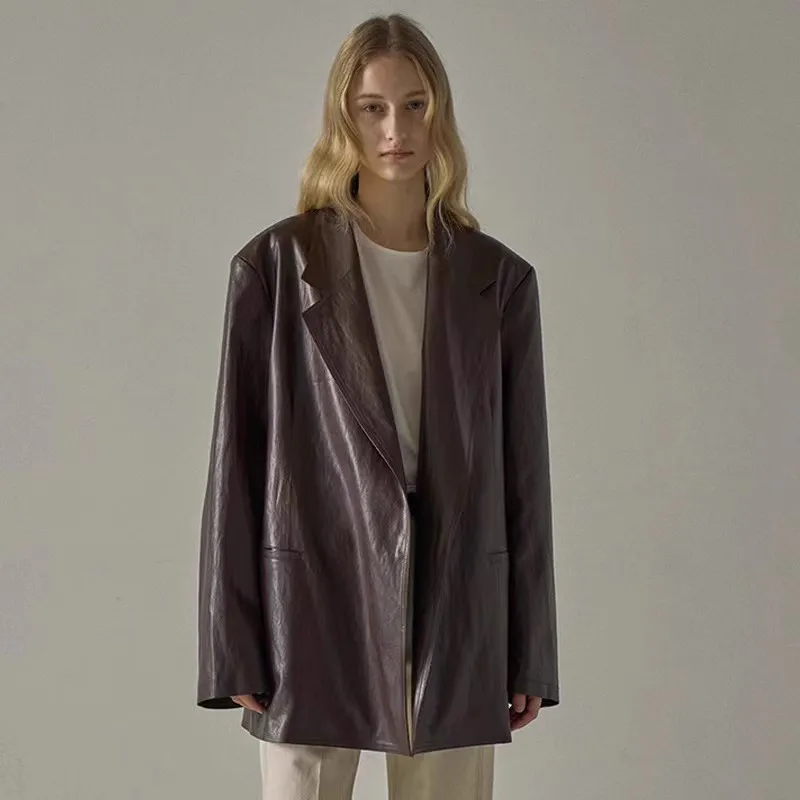 

Leather coat women 2023 autumn and winter loose mid-length niche designer suit