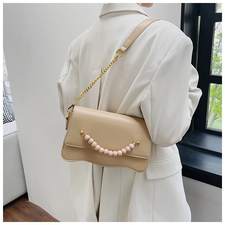 

Black Shoulder Bag for Women Small Makeup Bag Metal Chain Splicing Lotus Leaf Bead String Handbag Fashion PU Leather Bag 2023