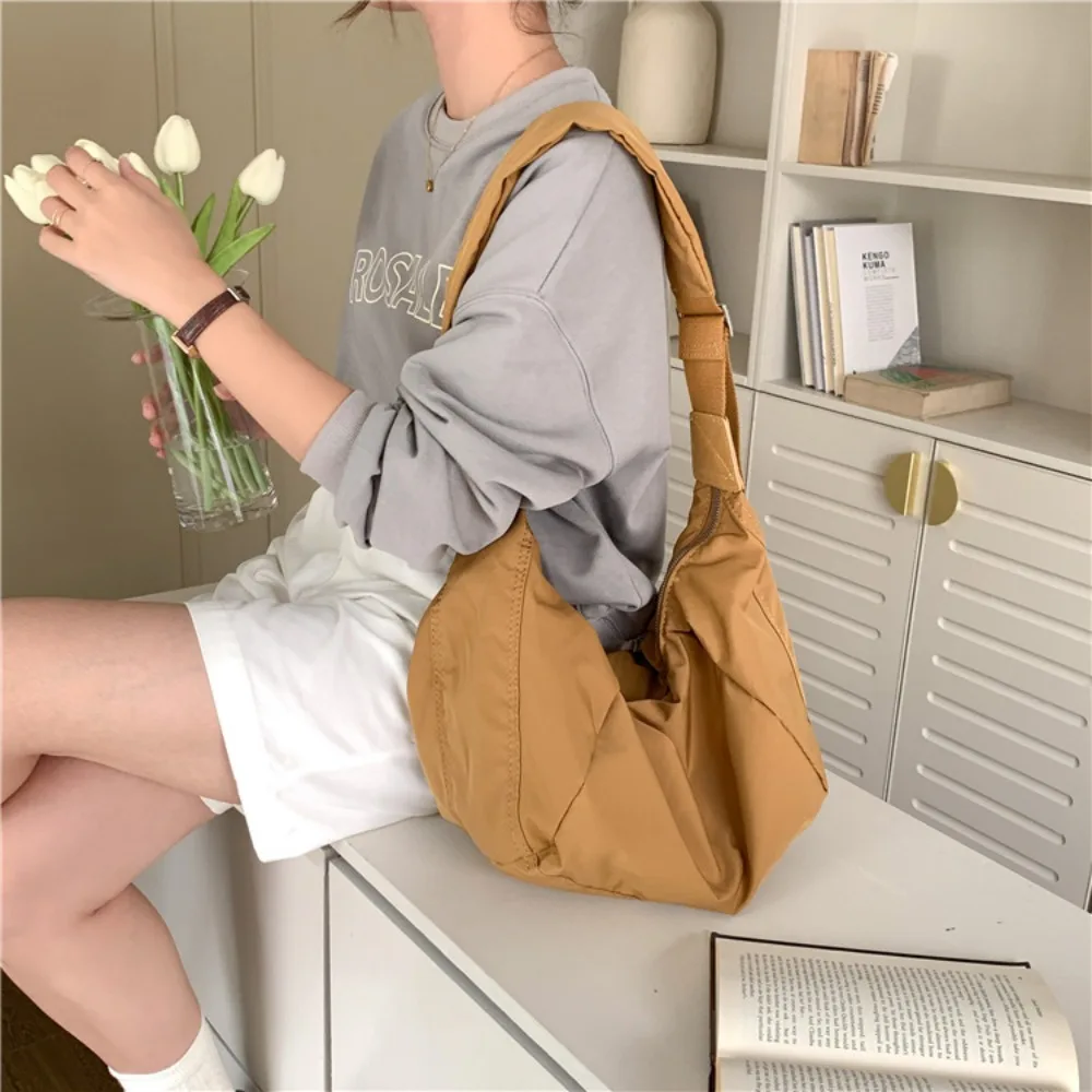 

Korea Large Capacity Crossbody Bag Niche Design Shoulder Messenger Bag Fashion Wide Shoulder Strap Nylon Dumpling Bag