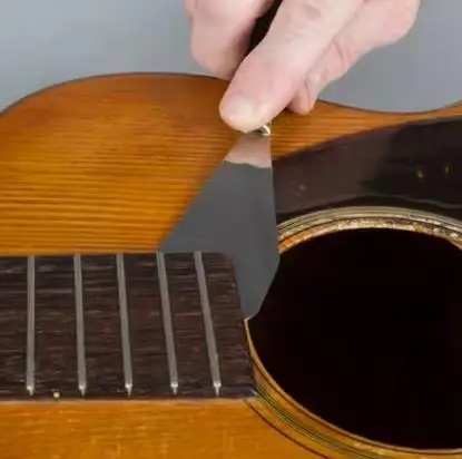 Acoustic guitar repair Professional instrument repair disassemble flat