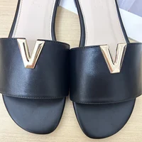 2024 summer new V-shaped metal decoration flat bottomed beach women's fashionable slippers - Image 5