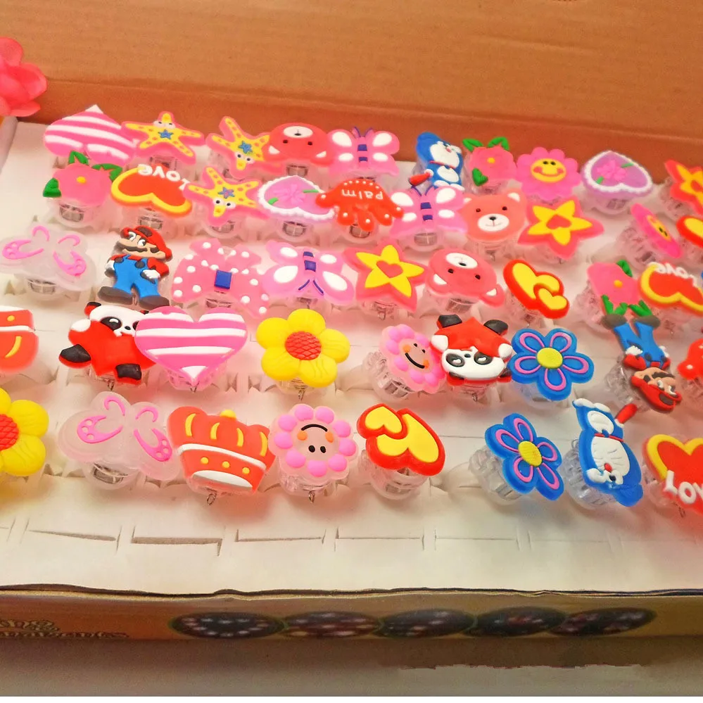 Party Toys Cartoon Ornaments Toy Gift Filler 15Pcs Cartoon LED Luminous Finger Rings Shine In The Dark Light Toys for Baby Girl Birthday Party Favors Gifts Goodie Bag