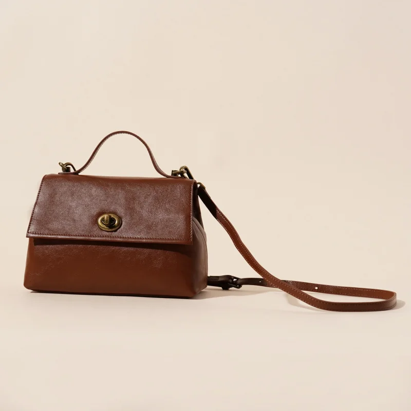 Retro top cowhide single shoulder small square bag, new flip cover crossbody bag, unique women's office crossbody bag