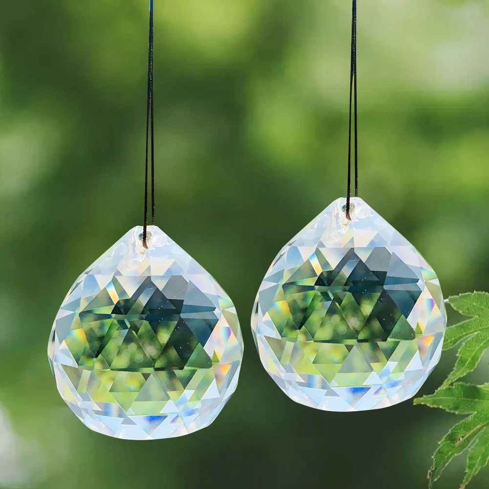 https://ae01.alicdn.com/kf/S88988f0d39a044d5961e1c3d338a2c13f/Boule-de-cristal-transparente-de-50MM-prisme-verre-brillant-pi-ces-de-lustre-suspendu-attrape-soleil.jpg