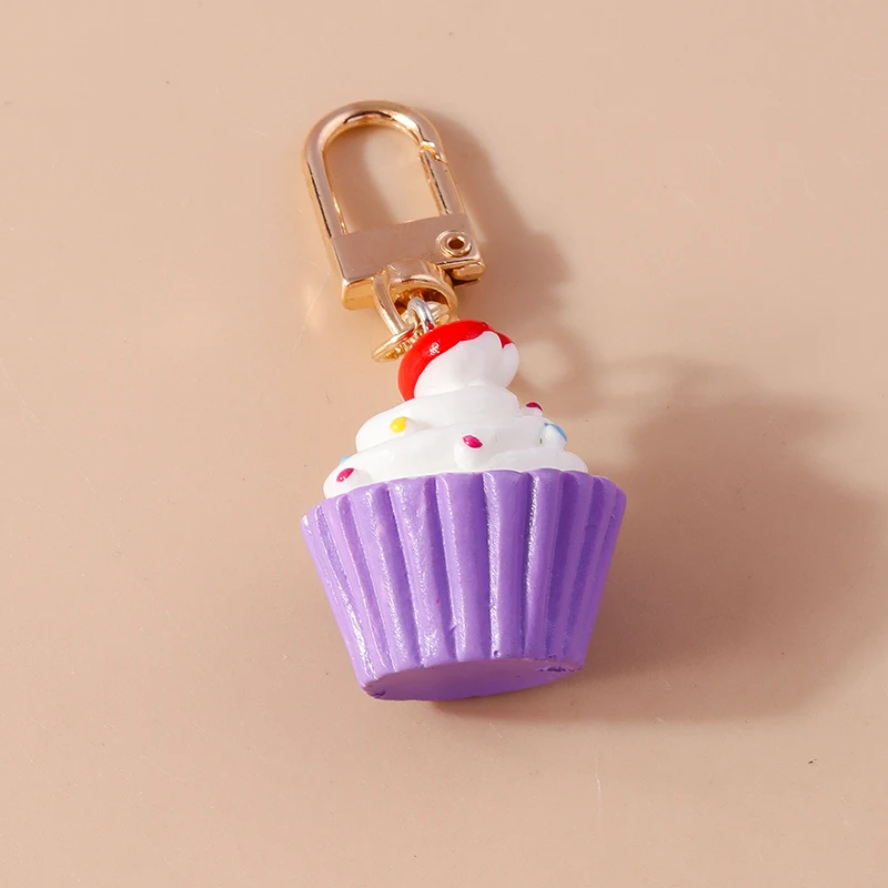Leuke sleutelhanger met hars macarons en Eiffeltoren motief voor aan je tas