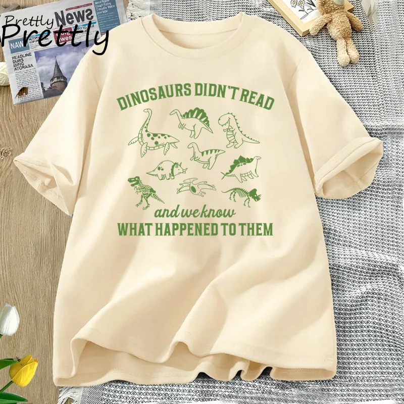 thumbnail image 1 of Camiseta retro Los dinosaurios no leían Camisetas gráficas para mujeres y hombres Camisetas para amantes de los libros Camisetas de animales de los años 90 Regalos de lectura Ropa para mujeres, 1 of 4