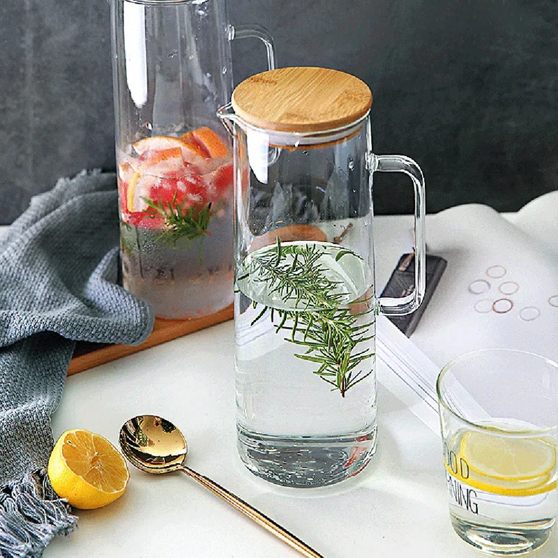 https://ae01.alicdn.com/kf/S889d3351cd4143f782af431194d87432B/1-7L-Glass-Water-Pitcher-With-Handle-Bamboo-Lid-Heat-Resistant-Cold-Hot-Kettle-Capacity-Tea.jpg