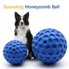 New Dog Toys Bite Resistant Interactive Throwing Sound Honeycomb Balls Natural Rubber Teething Clean Teeth Toys Pet Products 1