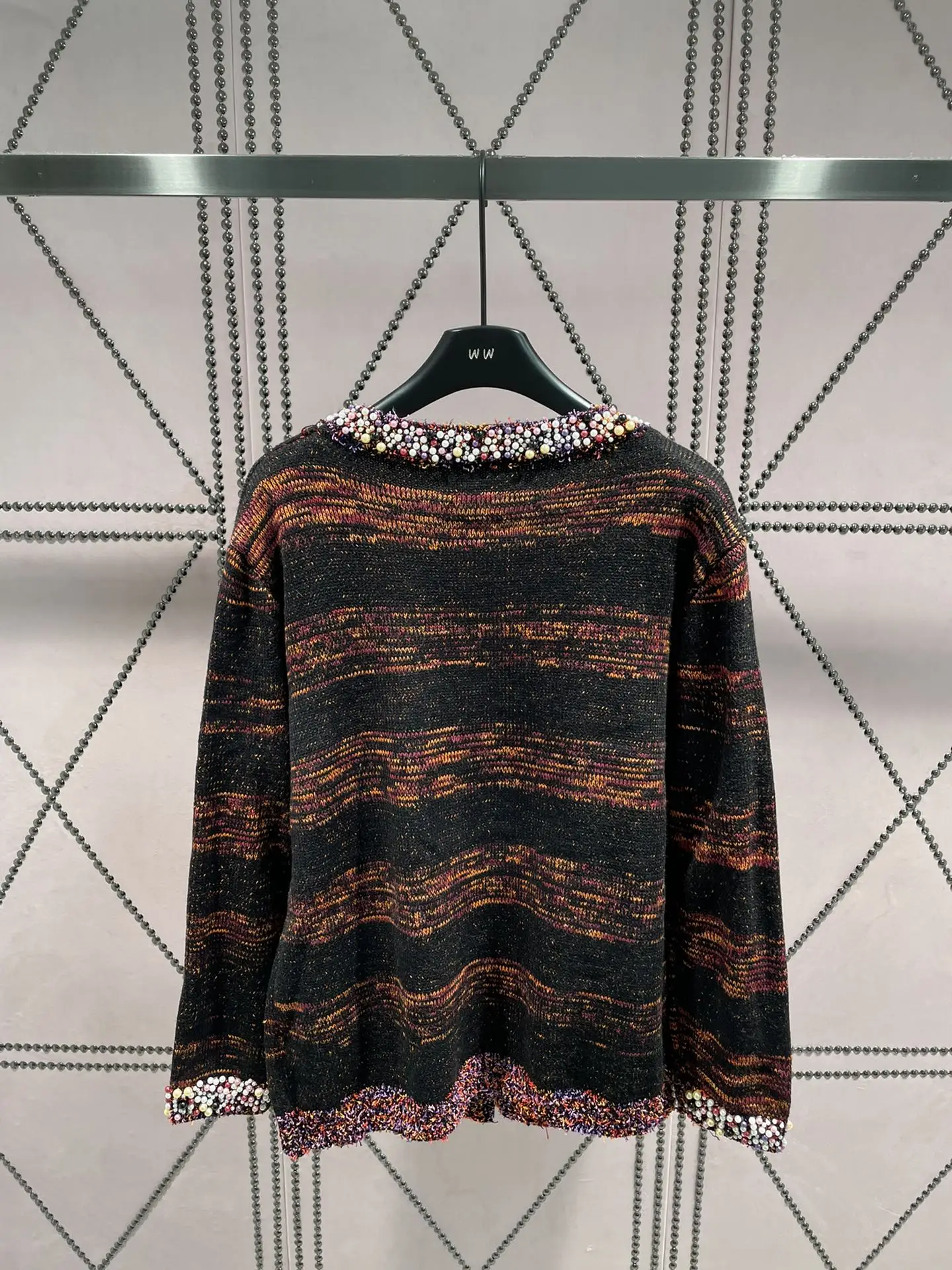 

The latest heavy handmade beaded knitted women's cardigan in early autumn 2023