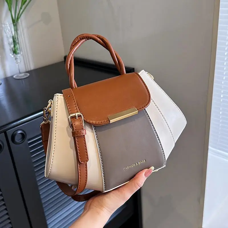 

2023 spring and summer contrast color handbag female niche design all small square bag senior texture shoulder bagDumpling bag