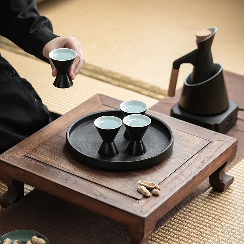 Japanese-style ceramic wine cabinet set includes 1 wine jug, 1 cabinet, 4 sake glasses, tray and candle heater