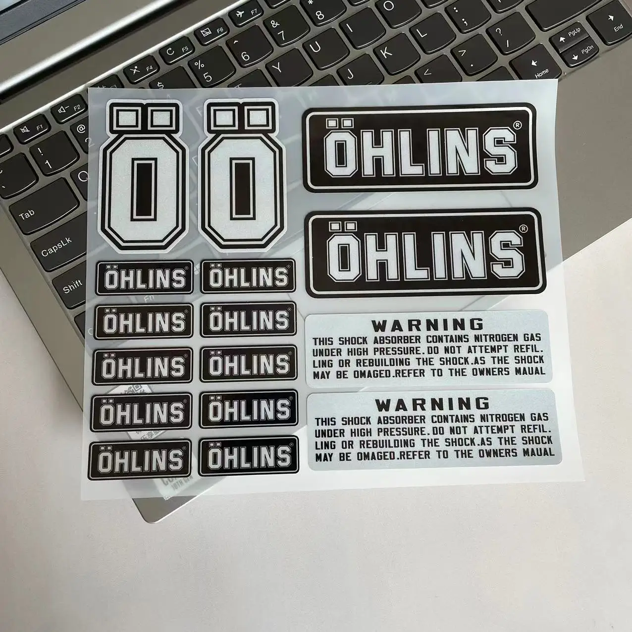 OHLINS   ݻ  ƼĿ,   ʸ  Ʈ 