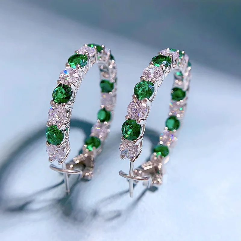 

Женские серьги-кольца из серебра 925 пробы с сапфиром и изумрудом