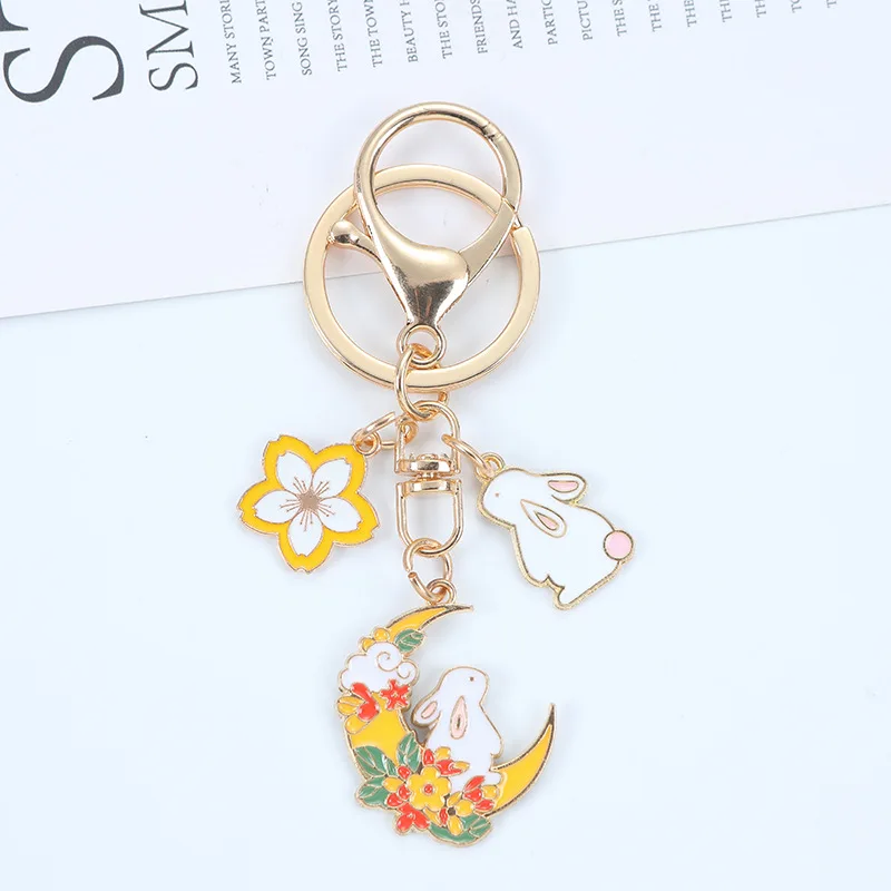 Portachiavi Fushi Coniglio su luna fiorata - bianco e giallo con fiore di ciliegio 244 S88f0791129724c6e8c8548b671a2d034t