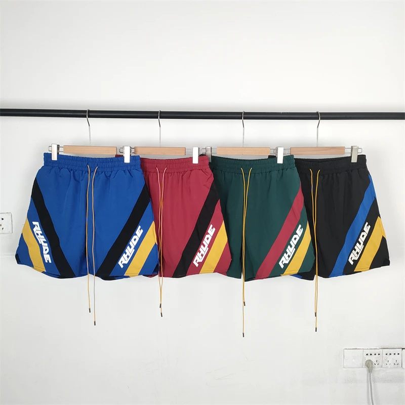 

23SS High Quality Patchwork Rhude Mesh Shorts Men Women Top Quality Quick Drying Yellow Drawstring Breeches Kanye West