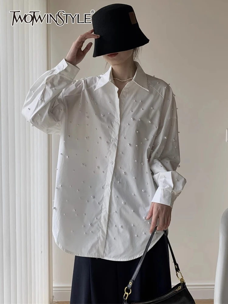 

TWOTWINSTYLE Solid Casual Patchwork Pearls Shirt For Women Lapel Soliced Single Breasted Loose Minimalist Blouse Female Fashion