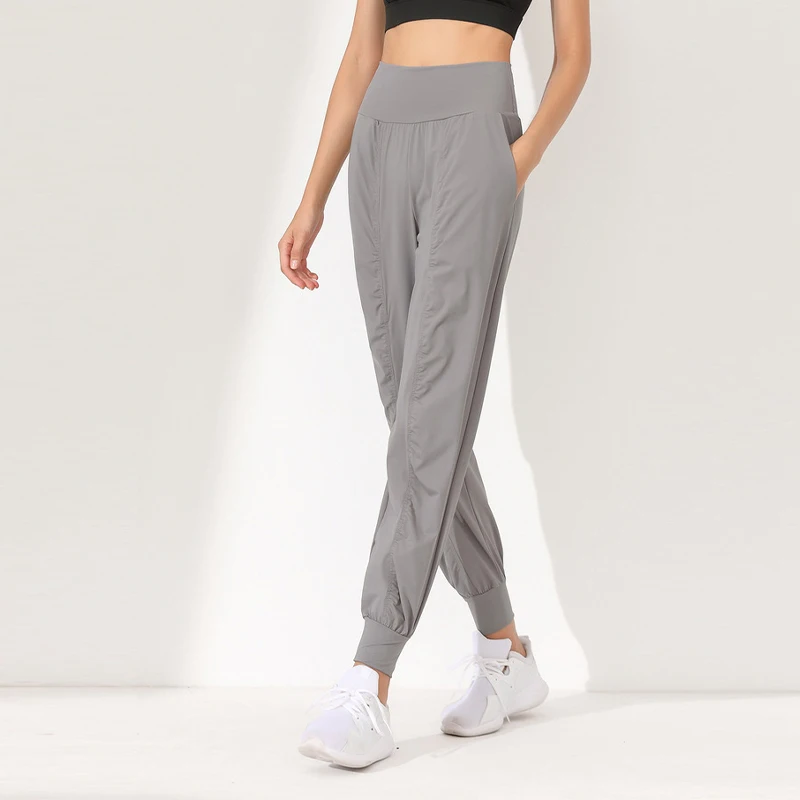 Yoga Pants Woman Loose Slim Quick-Dry Pleated Hem Bound Running Fitness Capris Pockets