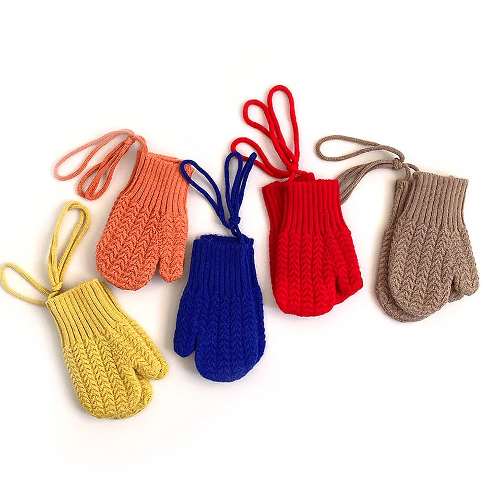 Winter Colorful Knit Gloves On A Snow Stock Photo - Image Of Navy