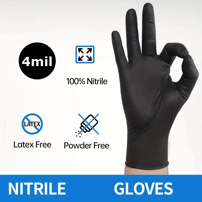 Gants jetables noirs enroulés, montrant leur texture fine et flexible.