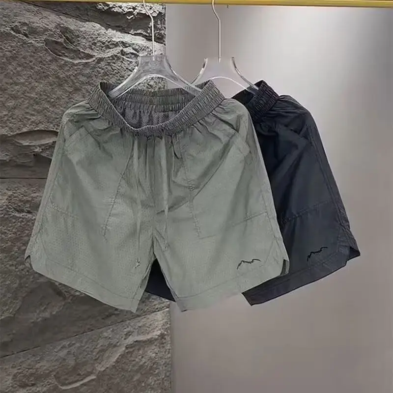 

2023 Summer Fashion Trend Thin Loose Perforated Shorts For Men's Breathable Mesh Quick Drying Versatile Casual Capris