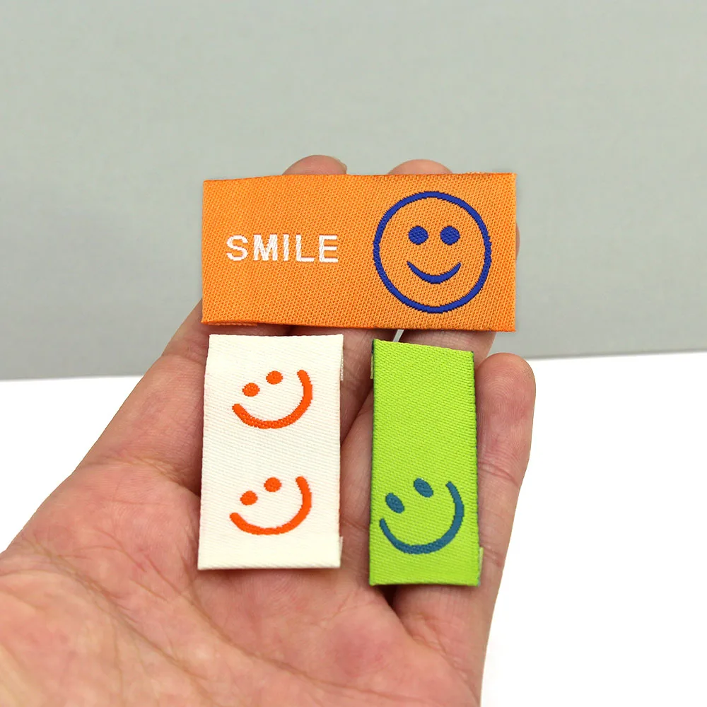 50Pcs Smiling Face Clothes Label Handmade Tags Clothing Embroidery Cotton Baby Hats Bags 20*39MM clothing labels,garment labels,sewing labels