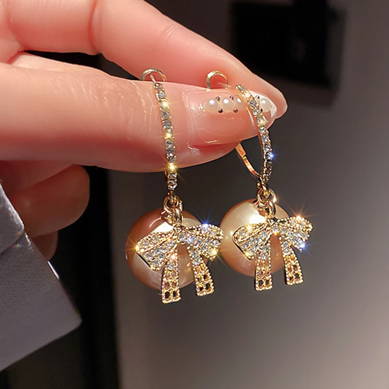 

Gold Color Zircon Bowknot Earrings For Women Red Pearl Bow Stud Earrings Festive Earring New Year Christmas Gift Party Jewelry