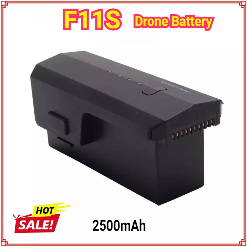 Batterie drone F11S blanche posée sur fond gris, autonomie prolongée pour voler plus longtemps.