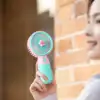 New Best-selling Portable USB Charging Handheld Fan with Stand Suitable for Home Office Vacation Outdoor Use Detachable Base 2