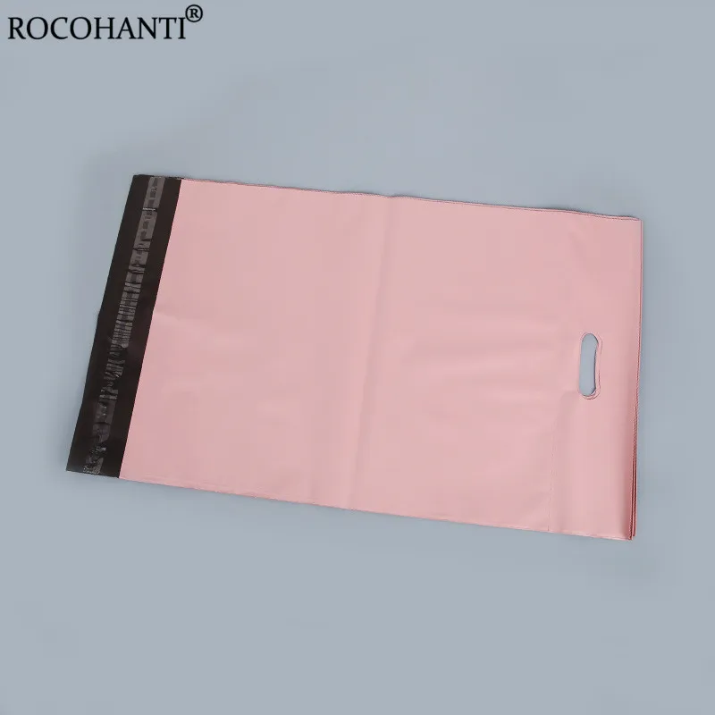 핑크 우편물 봉투 플라스틱 우편 가방, 의류 포장용 손잡이가 있는 배송 패키지, 100x 맞춤형 로고 폴리 우편 가방