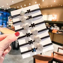 

Clover Love Plum Blossom Water Diamond Head Rope Diamond Multifunctional Horsetail Rubber Band Hair Ornament Hair Ring