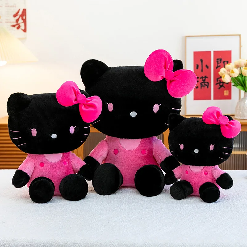 دمية محشوة هلو كيتي (Hello Kitty) باللون الأسود وا...