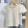 2025 النساء تي شيرت قصيرة الأكمام تيز عادية جديدة بلوزات بيضاء المرأة المحملة التطريز موضة السيدات تي شيرتات قطن المرأة تيز القمم